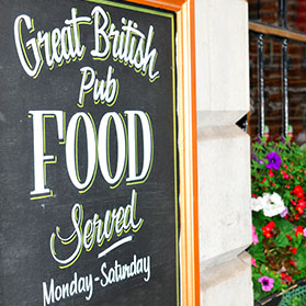 Pub sign with great British food written on it.